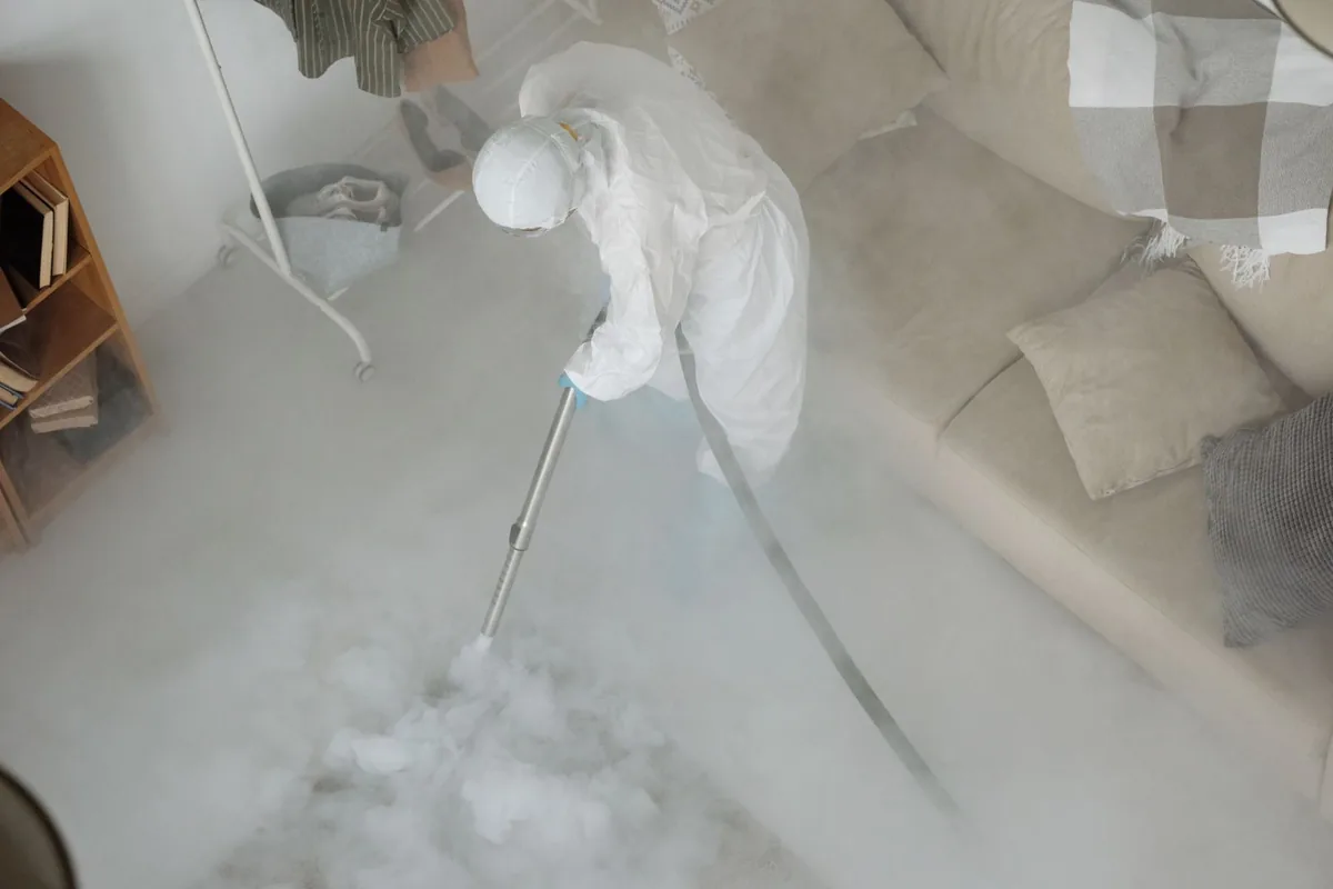Biohazard cleanup technician in protective equipment, Orange Lake, NY